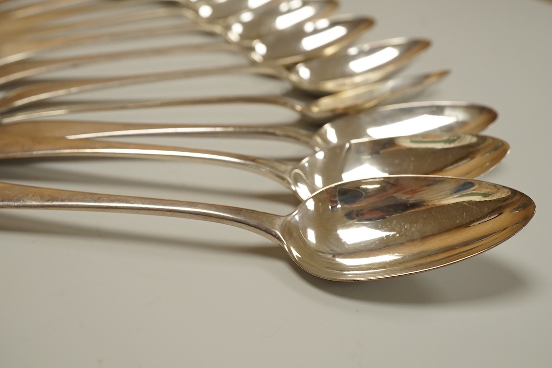 Eleven assorted 19th century silver Old English pattern dessert spoons, various dates and makers, 15.5oz.